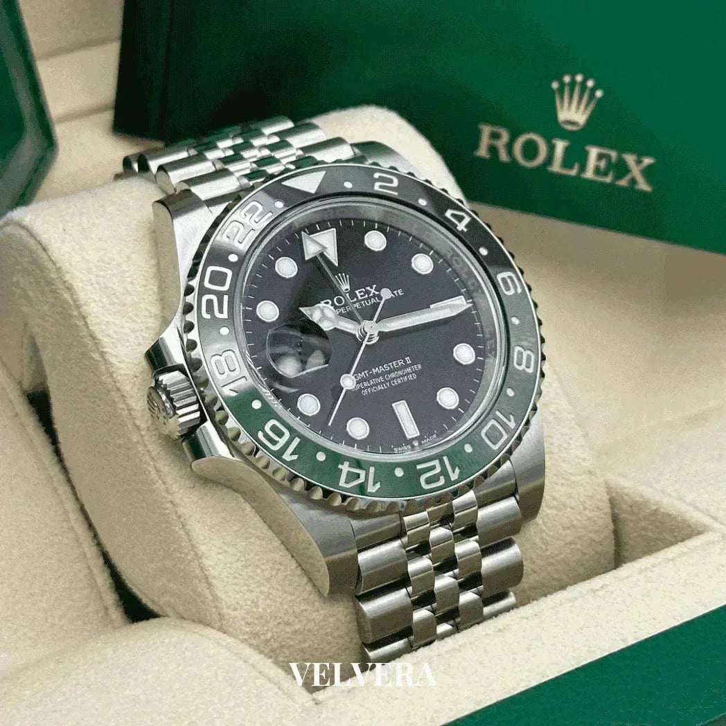 Rolex GMT-Master II stainless steel watch with green and black bezel in display box