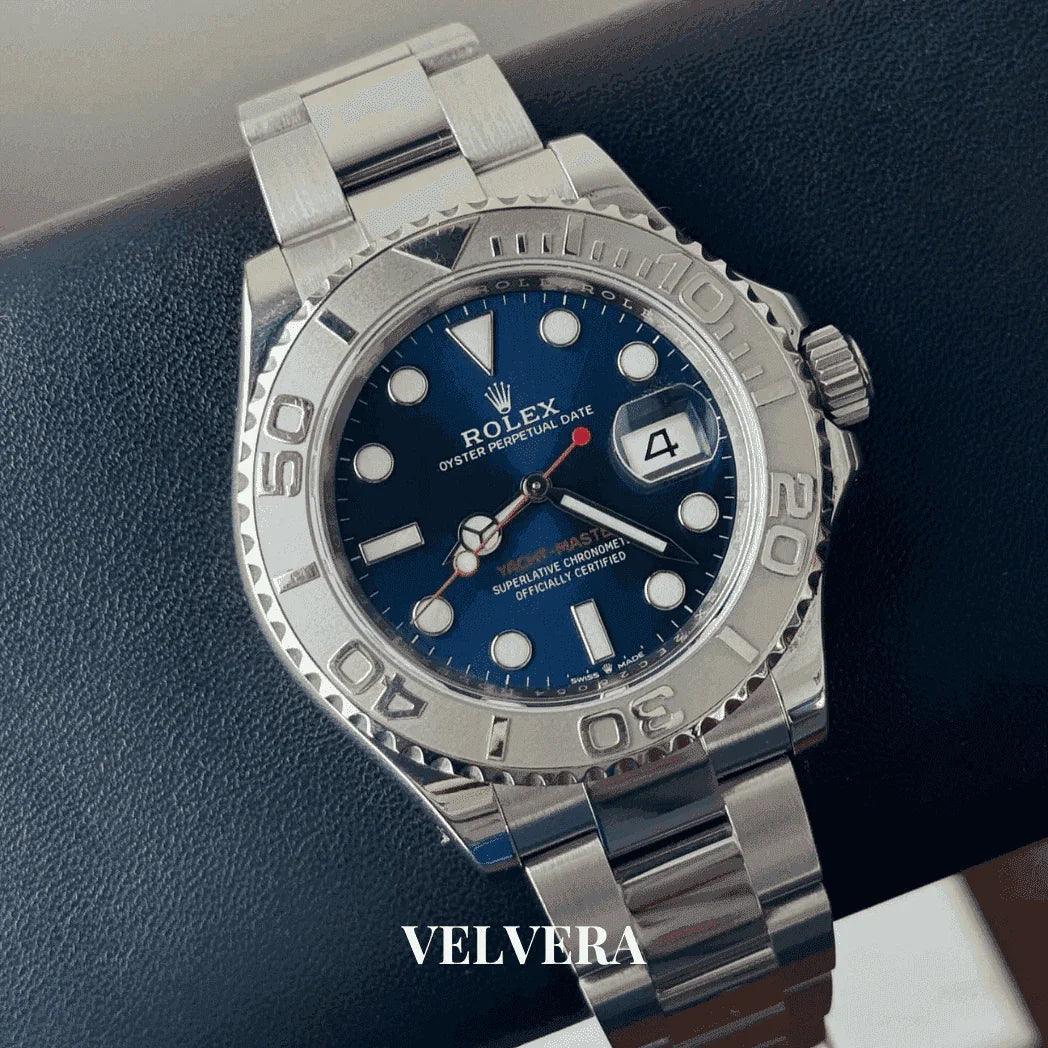 Rolex Yacht-Master blue dial luxury watch with stainless steel bracelet on display, Velvera