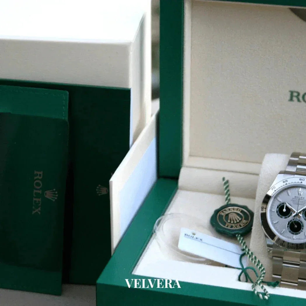 Rolex luxury watch in green box with tags, warranty card, and branded packaging