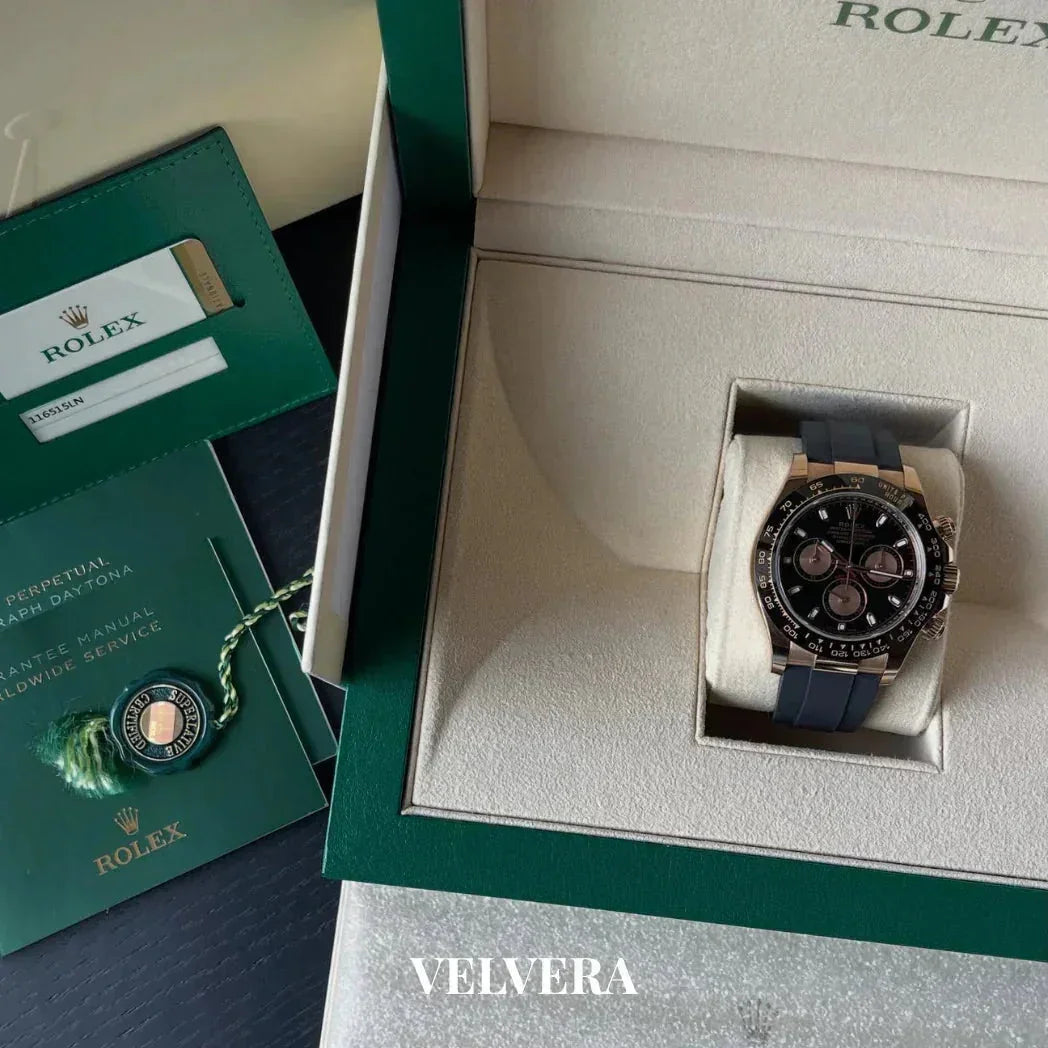 Rolex Daytona black dial watch in box with authenticity card and guarantee manual