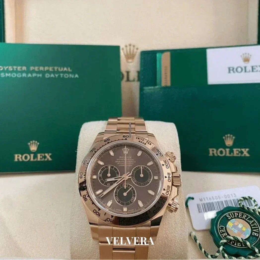 Rolex Daytona rose gold chronograph watch with original green Rolex box and certification