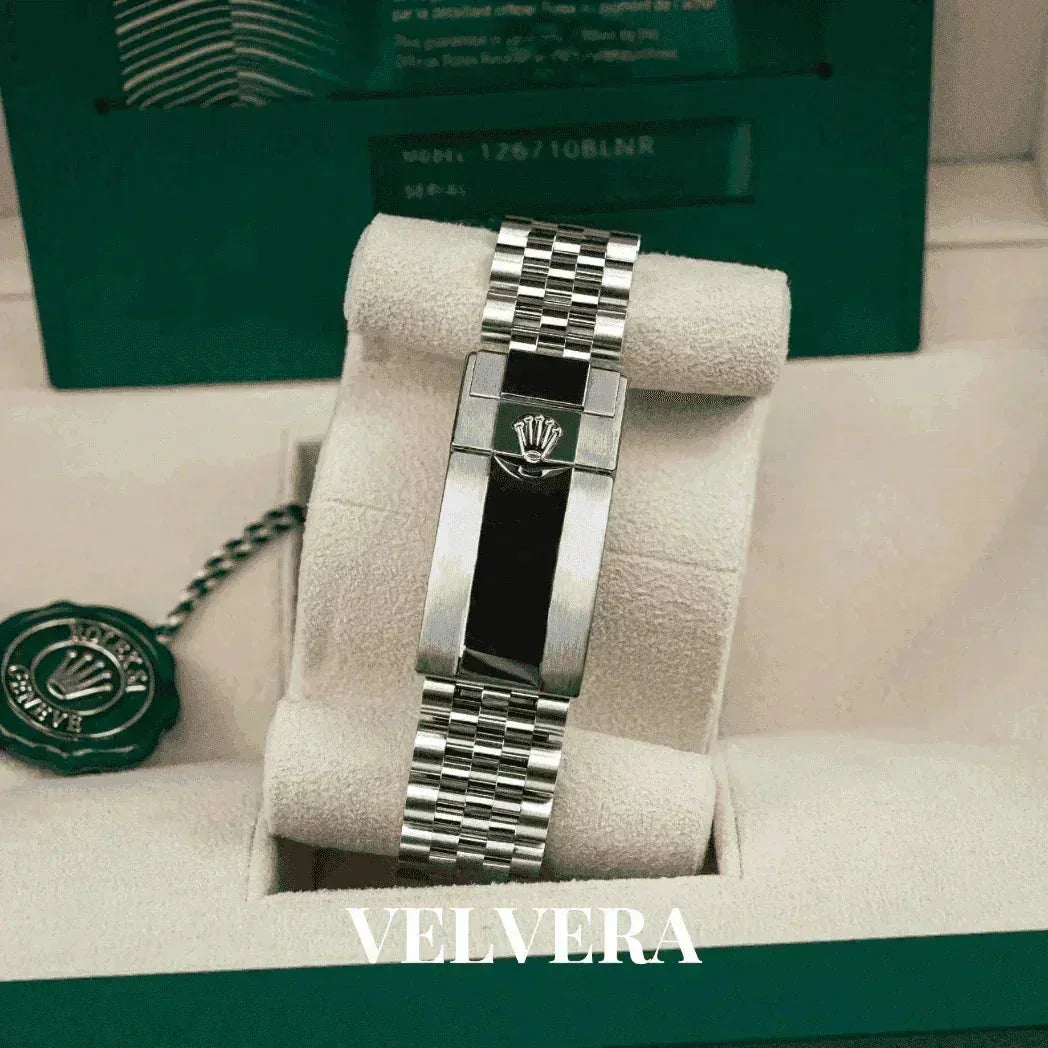 Rolex Jubilee bracelet in a green box with Rolex tag, Velvera branding visible