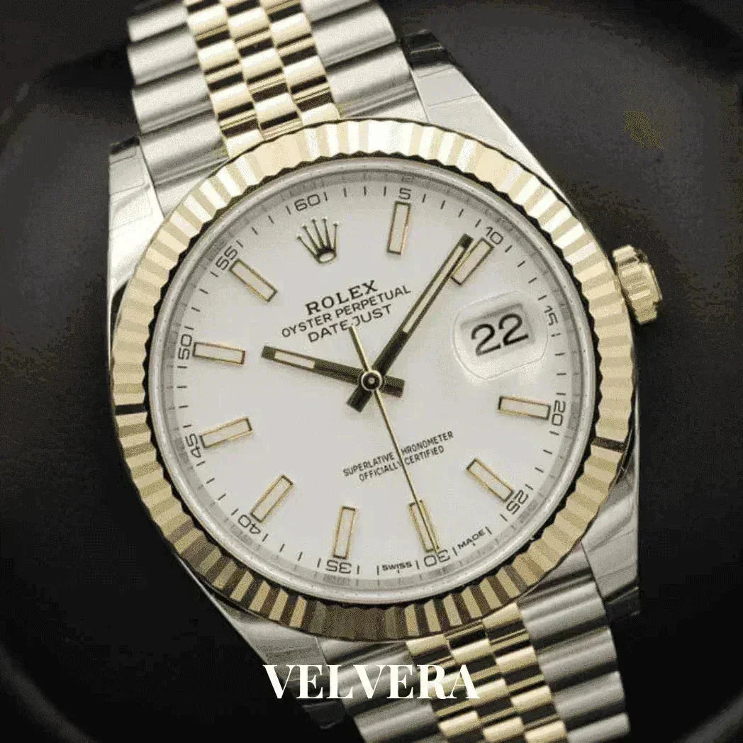 Rolex Datejust 41mm white dial, jubilee bracelet, gold bezel, close-up, Velvera