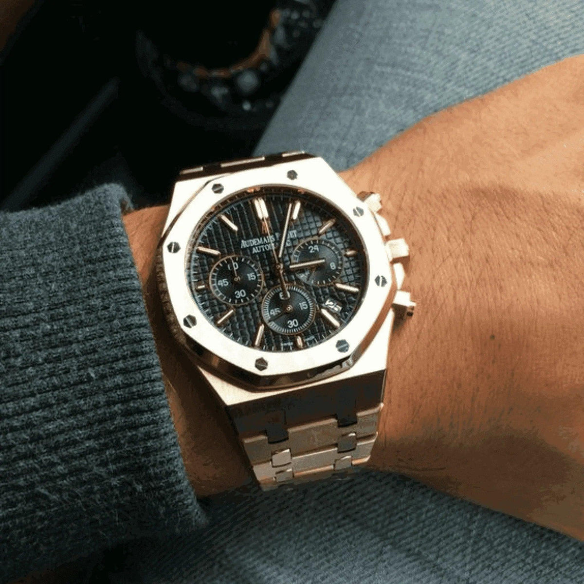 Luxury Audemars Piguet Royal Oak chronograph watch on wrist, stainless steel, black dial