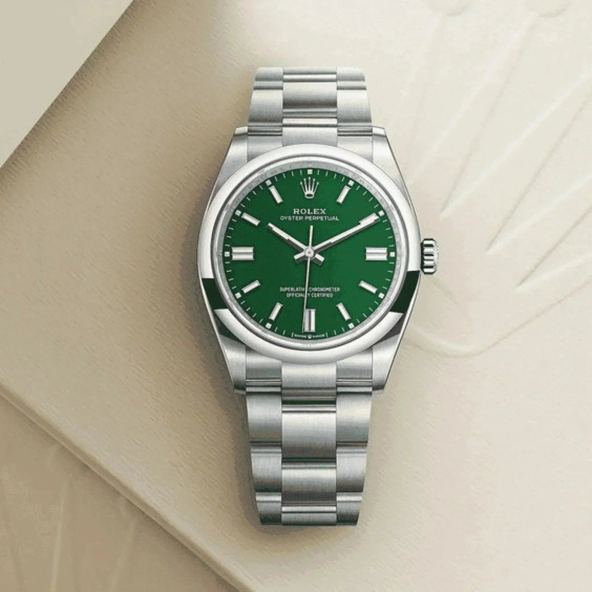 Men's classic 41mm stainless steel watch with green dial on beige background