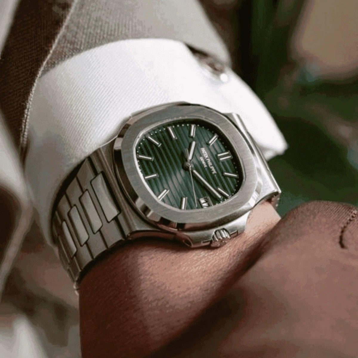 Luxury Patek Philippe Nautilus 5711A olive green dial men's watch on wrist