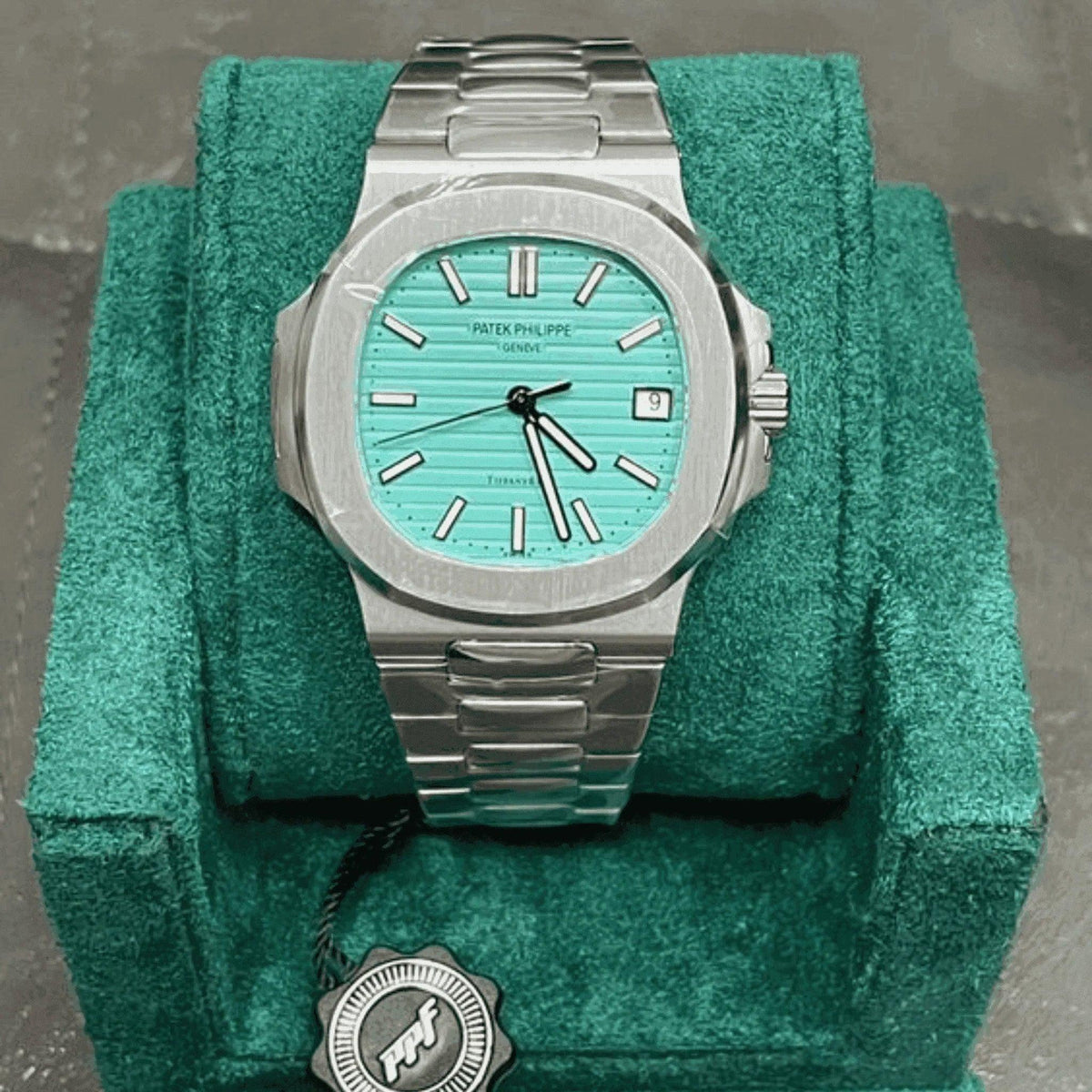 Patek Philippe Nautilus Tiffany blue dial men's watch on green velvet display