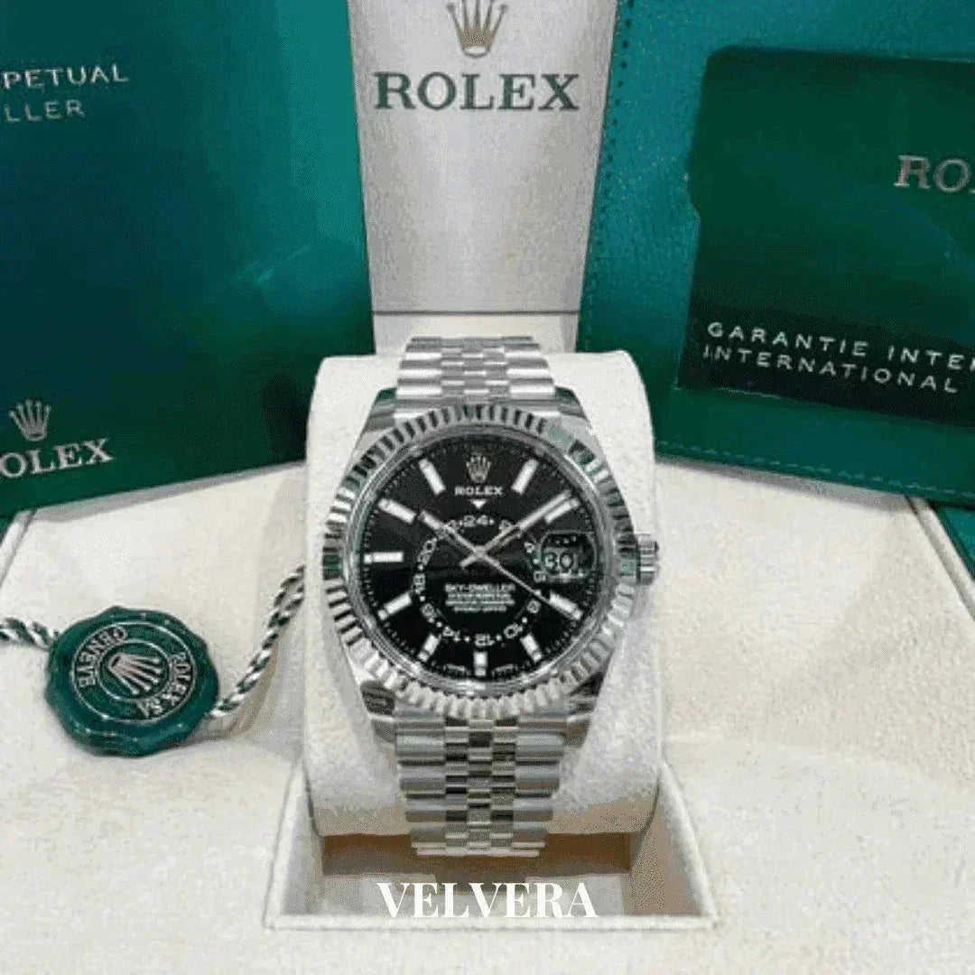 Rolex Sky-Dweller men's watch with black dial and Jubilee bracelet, boxed with warranty card.