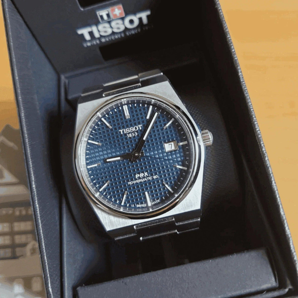 Tissot PRX Powermatic 80 men's watch with blue textured dial in box