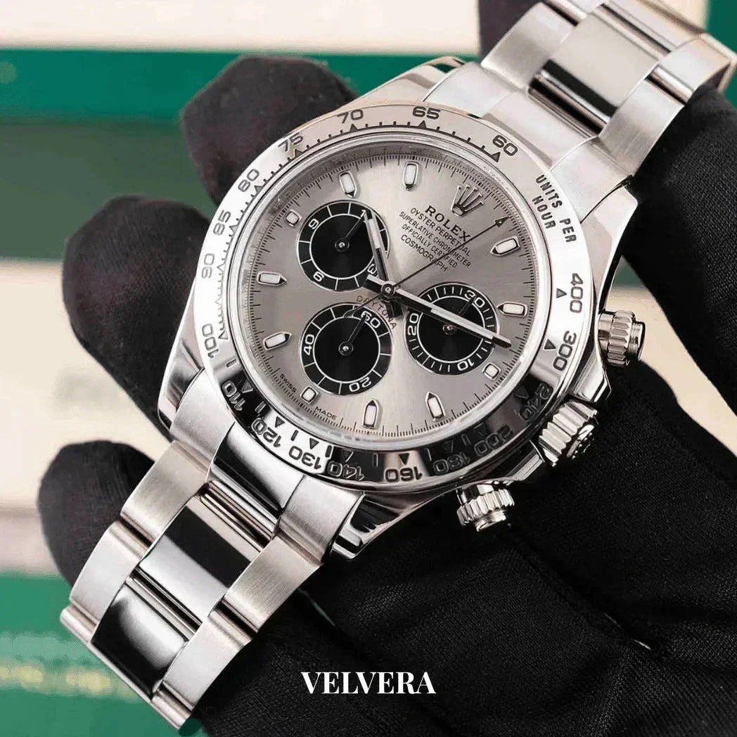 Luxury Rolex Daytona silver chronograph watch with black dials, stainless steel band, VELVERA