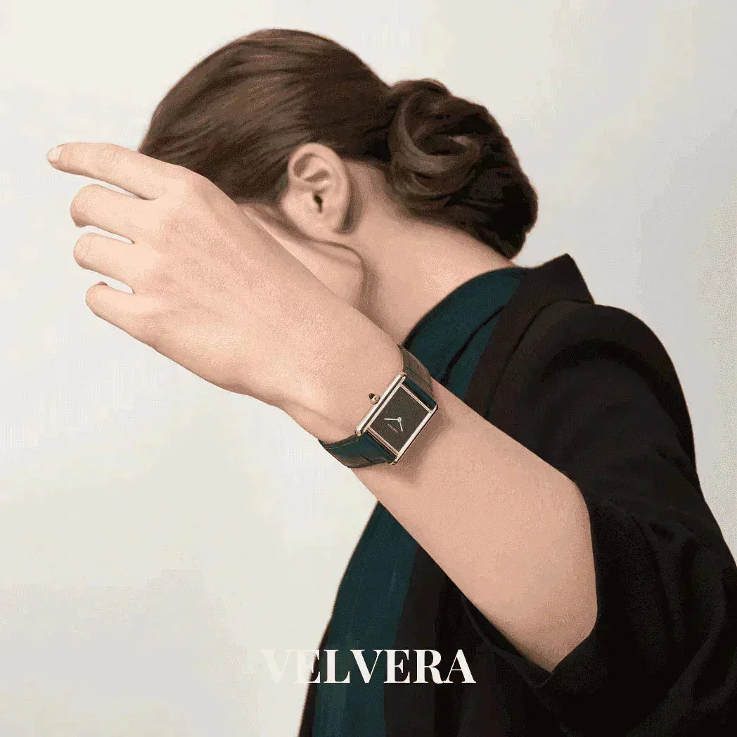 Woman wearing a VELVERA rectangular black leather wristwatch, minimalist style