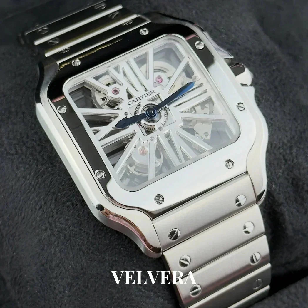 Luxury Cartier skeleton watch with silver bracelet and Roman numeral dial on gray fabric