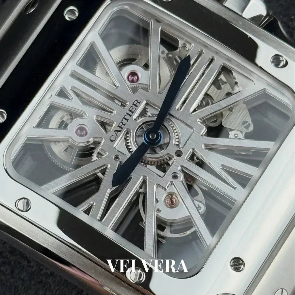 Close-up of Cartier skeleton watch with exposed gears and blue hands, VELVERA branding