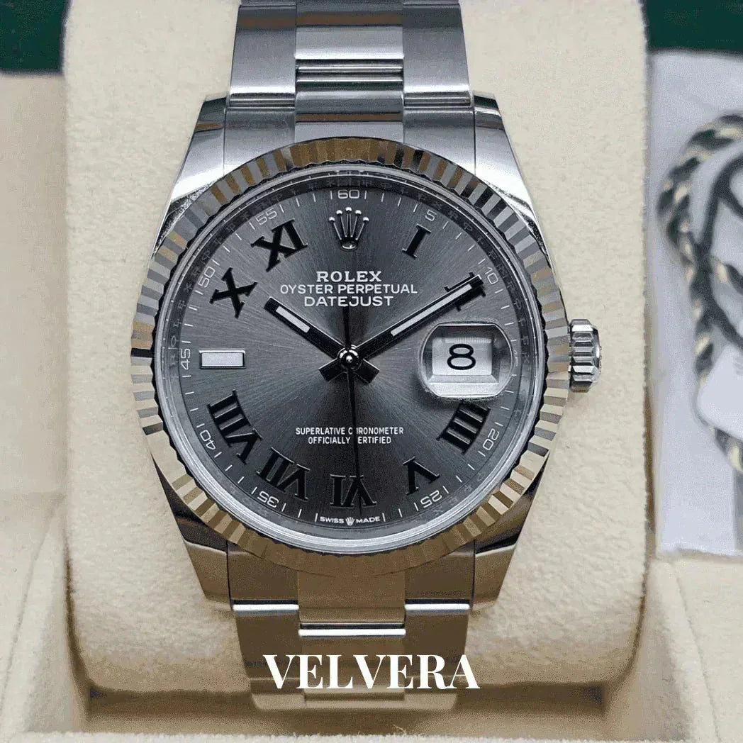 Rolex Oyster Perpetual Datejust silver watch with Roman numerals in display box, VELVERA logo