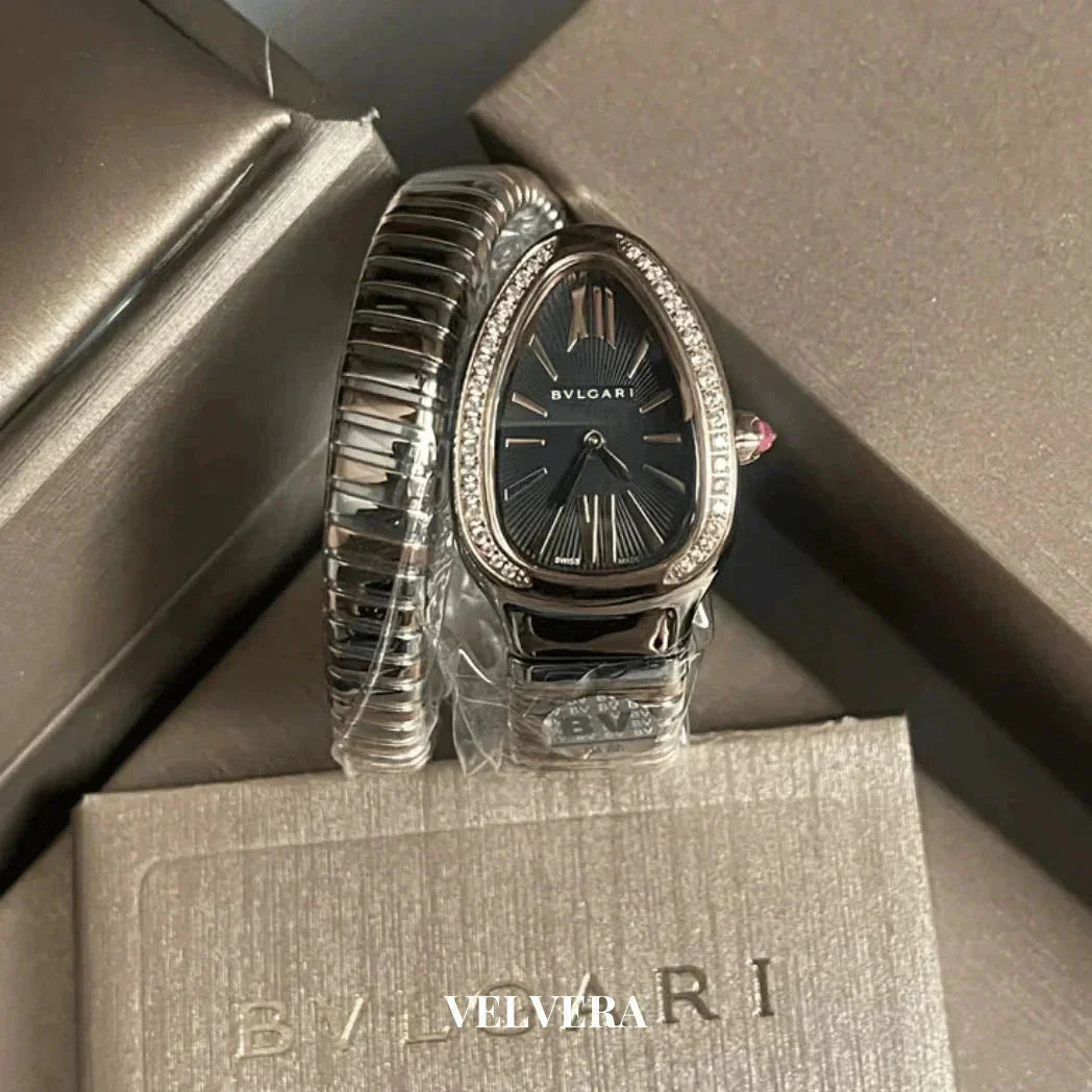 Bvlgari Serpenti silver diamond watch with black dial on luxury branded box