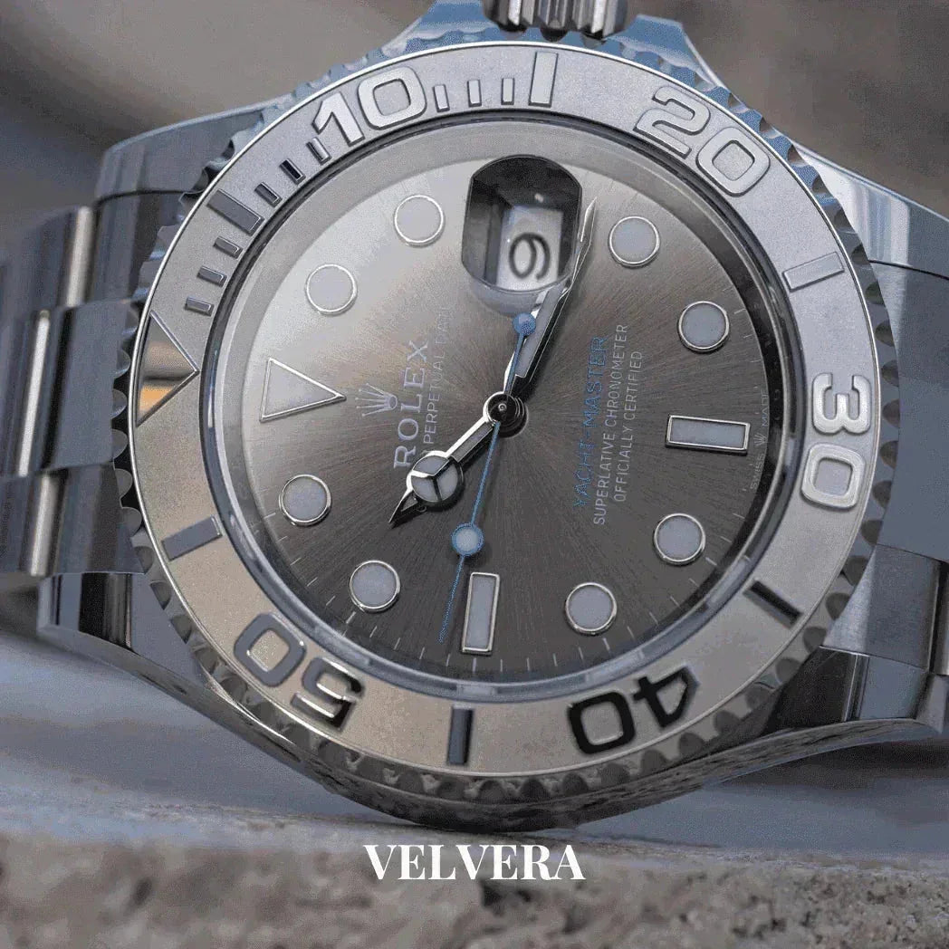 Luxury Rolex Yacht-Master silver watch close-up on metal band, VELVERA branding visible