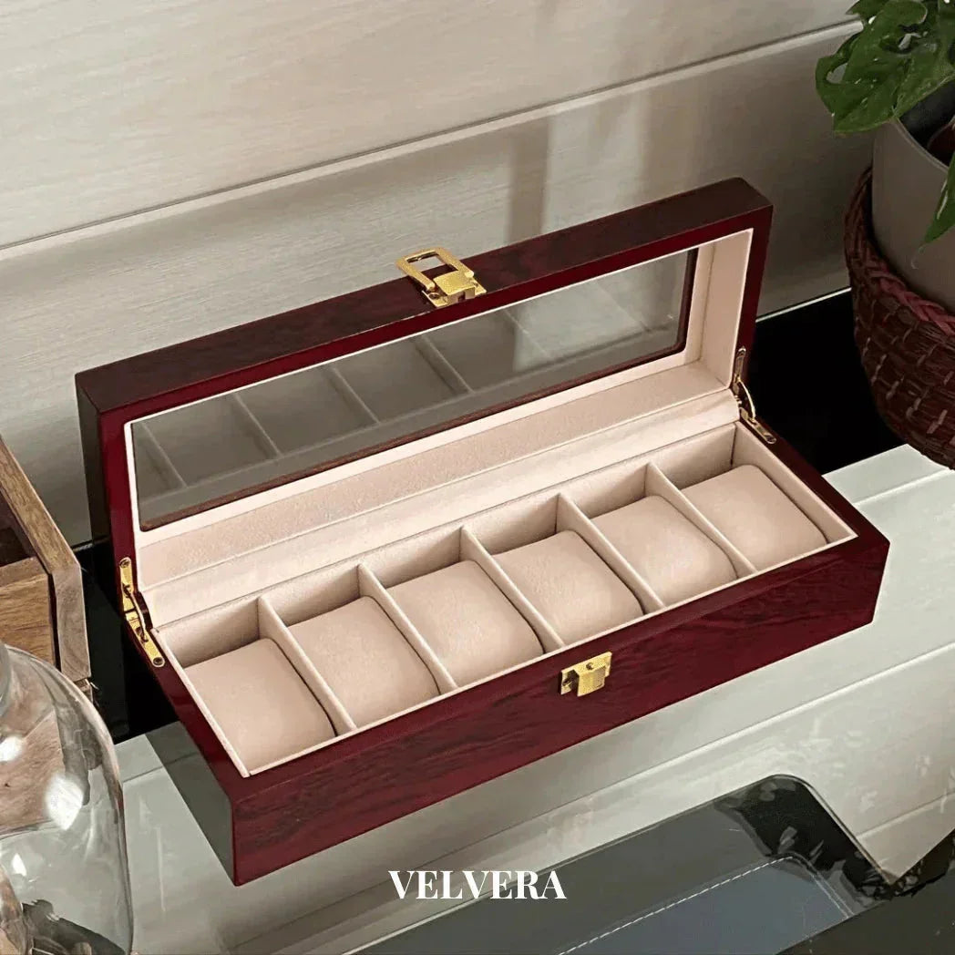 Wooden watch box with glass lid, gold clasp, six slots, on a modern table, Velvera brand