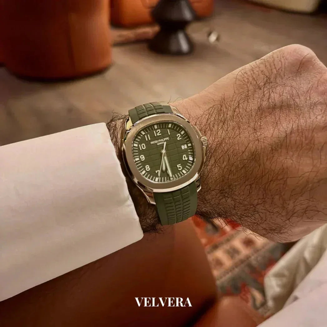 Luxury Patek Philippe green rubber strap watch on wrist, white shirt, VELVERA branding
