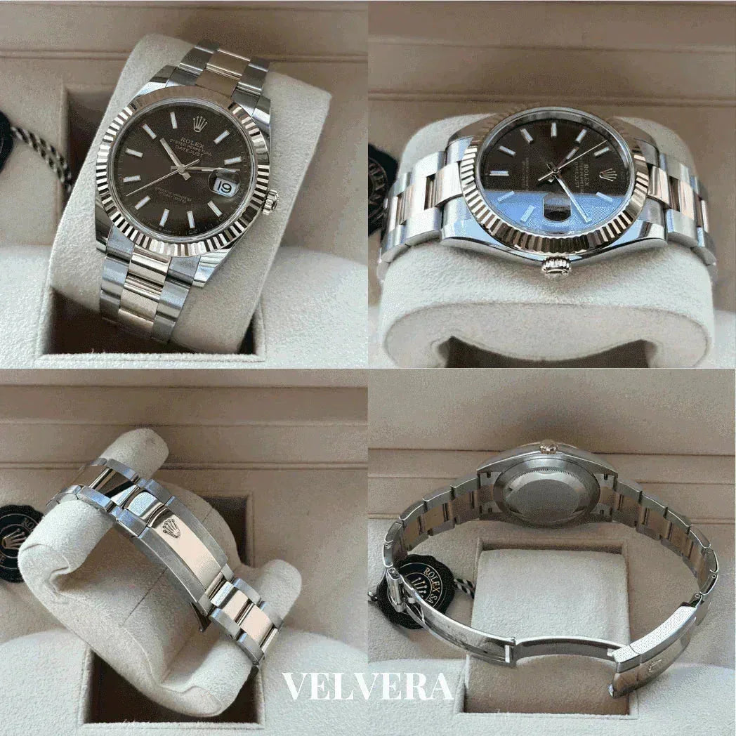 Luxury silver Rolex watch with black dial and stainless steel bracelet in velvet display box