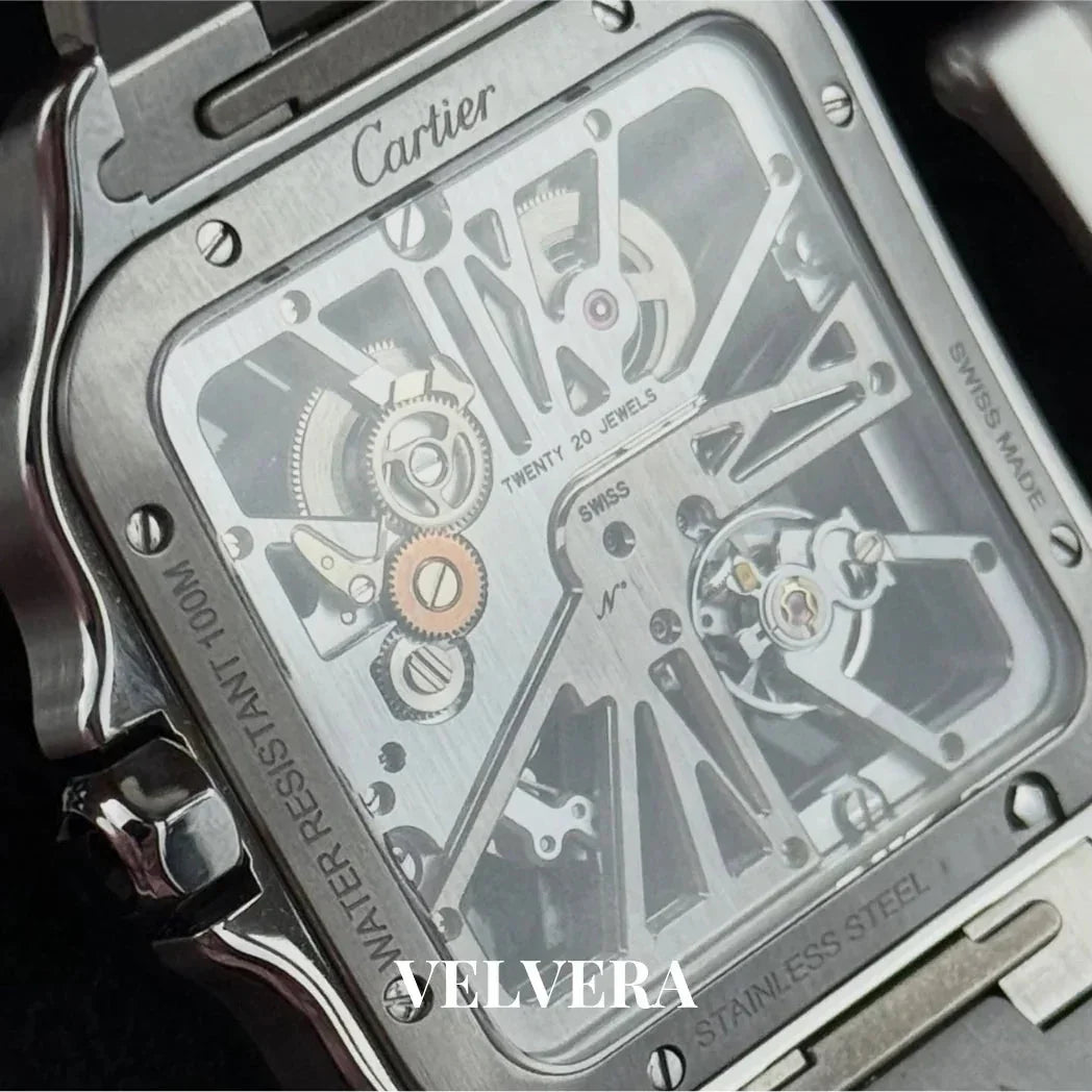 Close-up of Cartier skeleton stainless steel watch with visible gears and Velvera branding