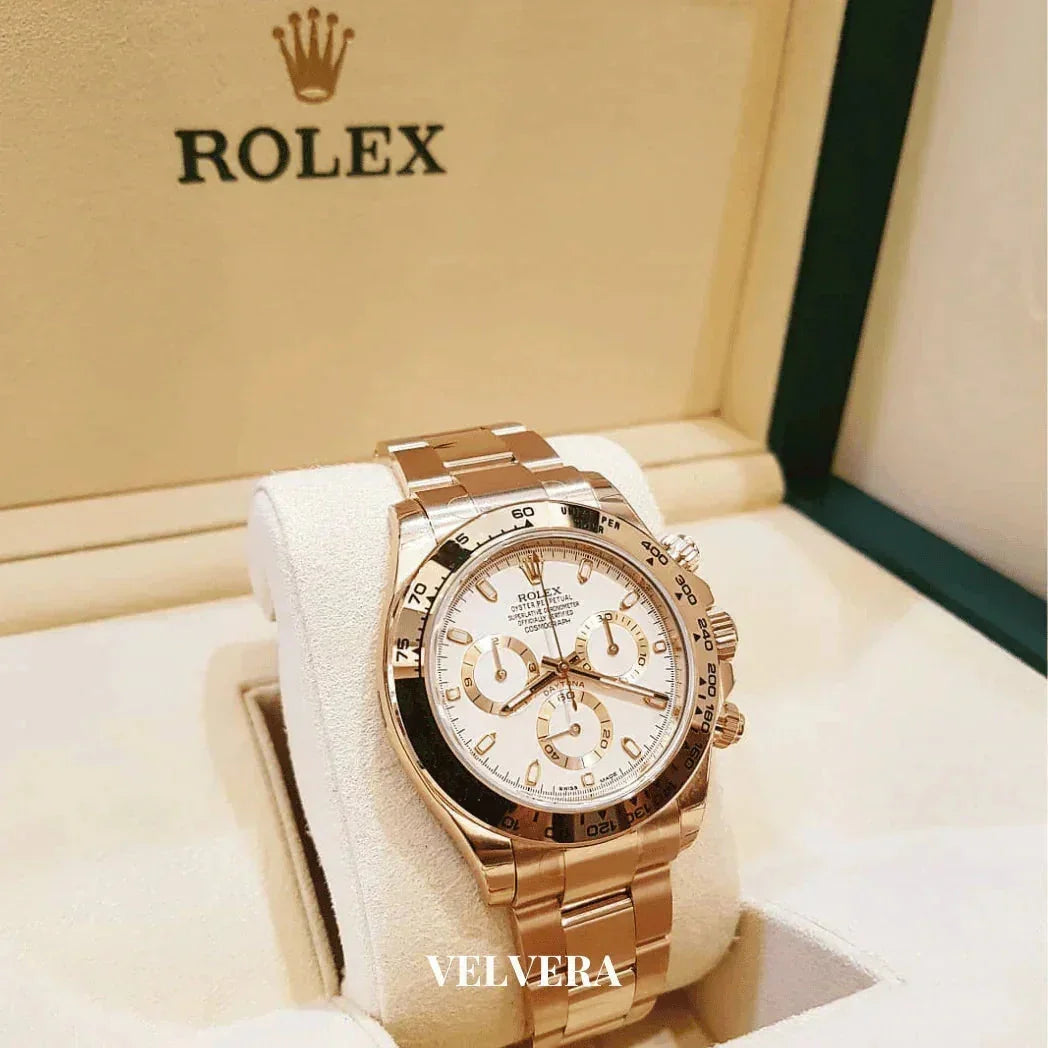 Rolex gold chronograph watch with white dial in display box, luxury watch VELVERA branding
