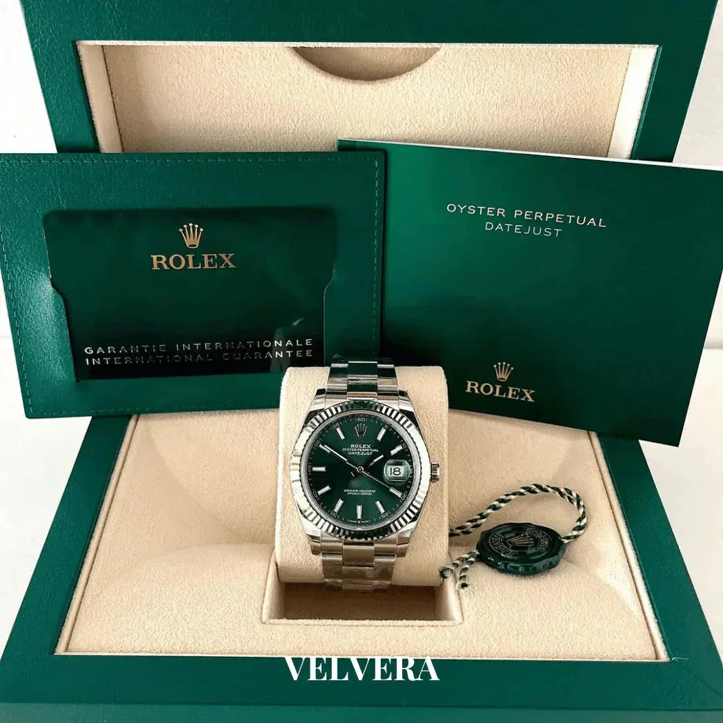 Rolex Oyster Perpetual Datejust green dial watch in box with certificate and guarantee card