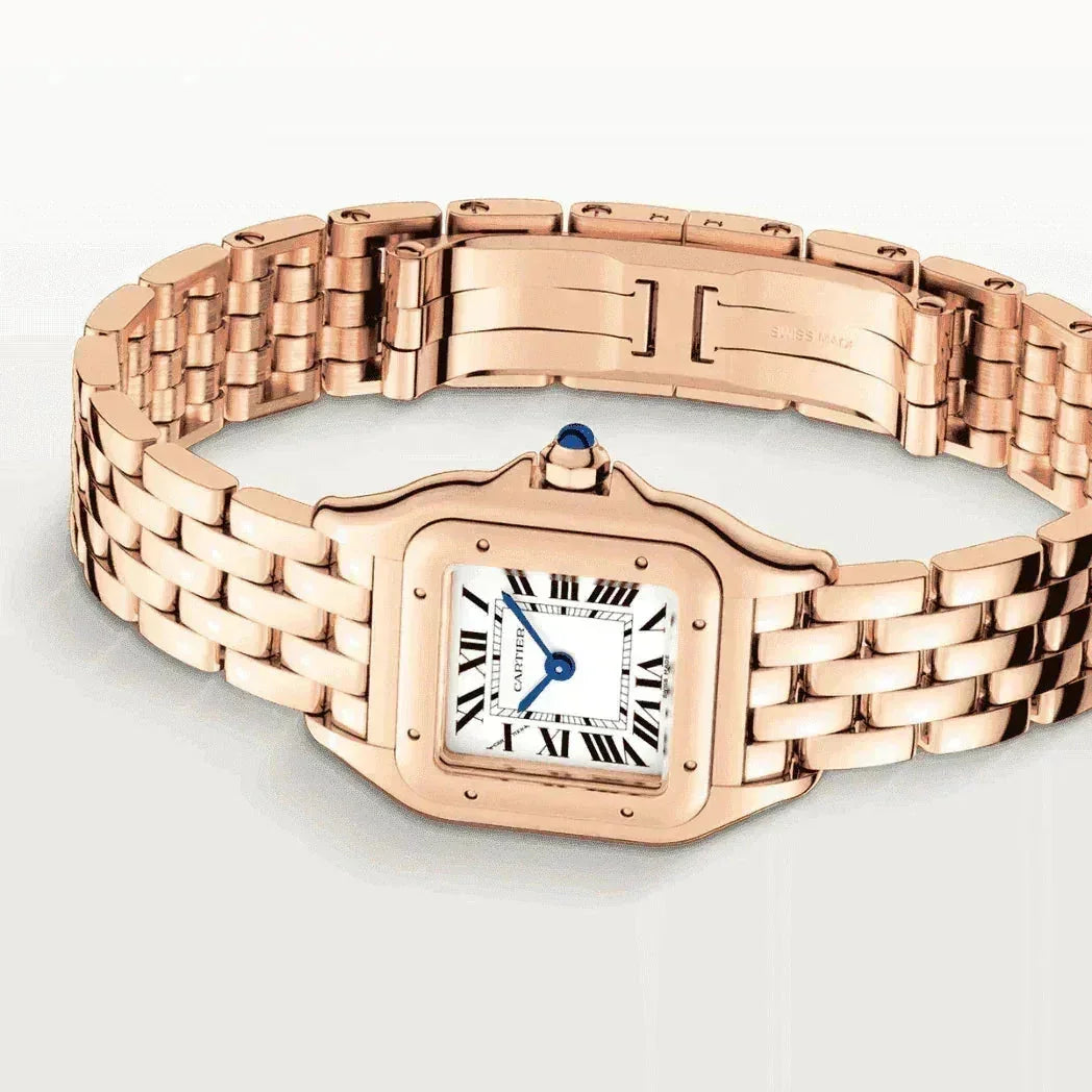 Women's rose gold watch with Roman numerals, white dial, luxury bracelet design