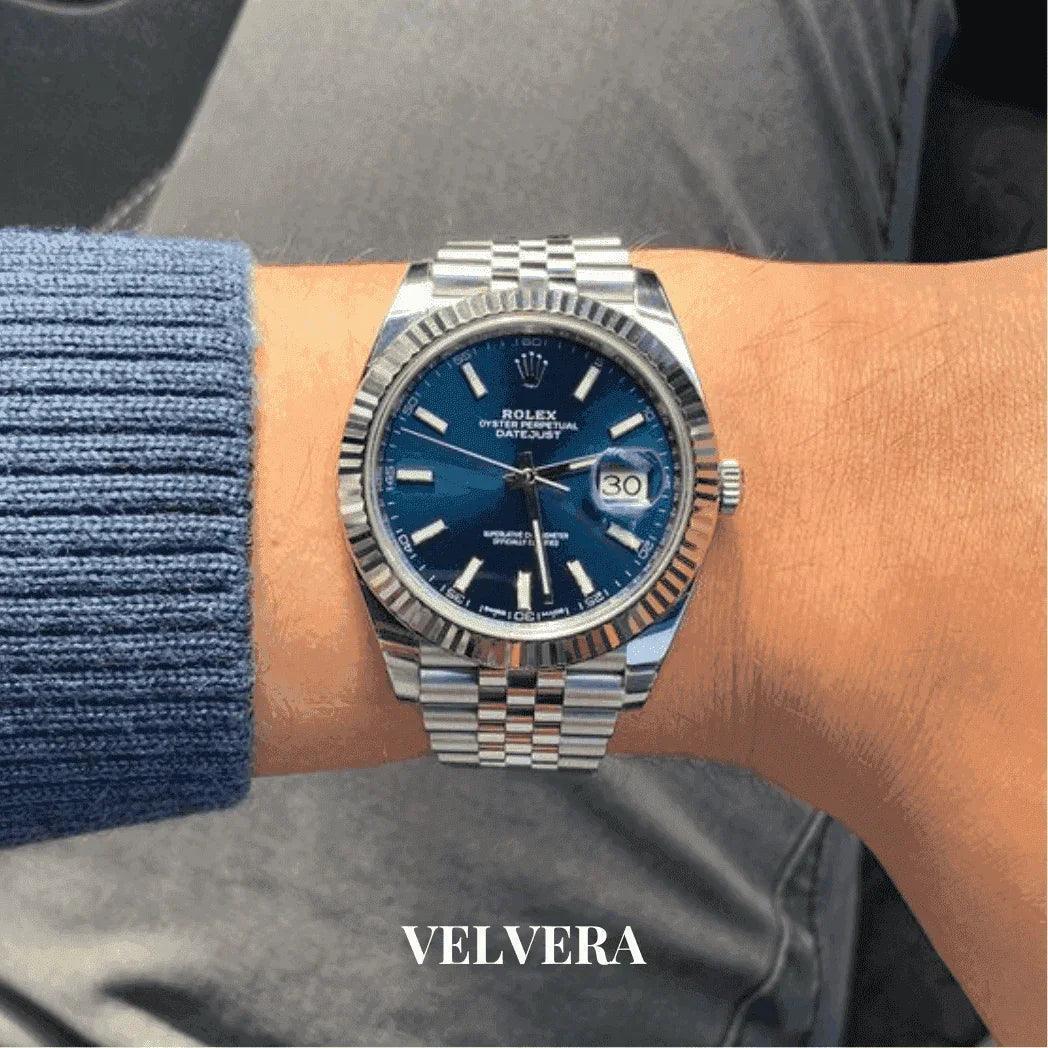 Rolex Datejust 41 blue dial men's watch with silver bracelet on wrist, VELVERA logo