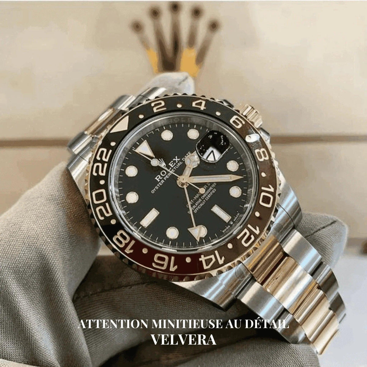 Rolex GMT-Master II Root Beer 126711 CHNR watch with two-tone bracelet, displayed by Velvera.