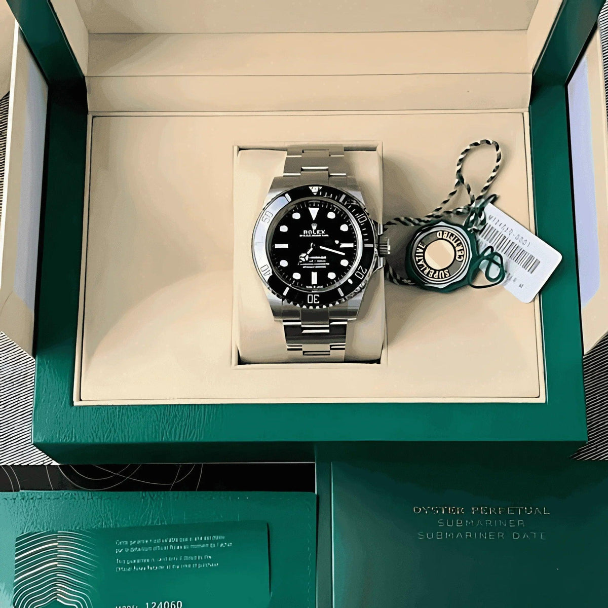Rolex Submariner black dial men's watch in green box with tags and documentation
