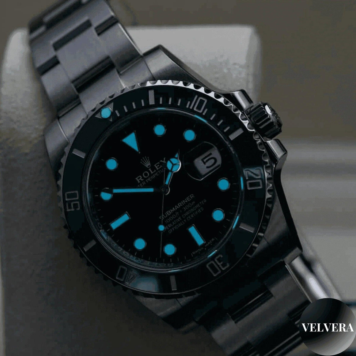 Men's Rolex Submariner Hulk watch with luminous green markers on silver metal bracelet