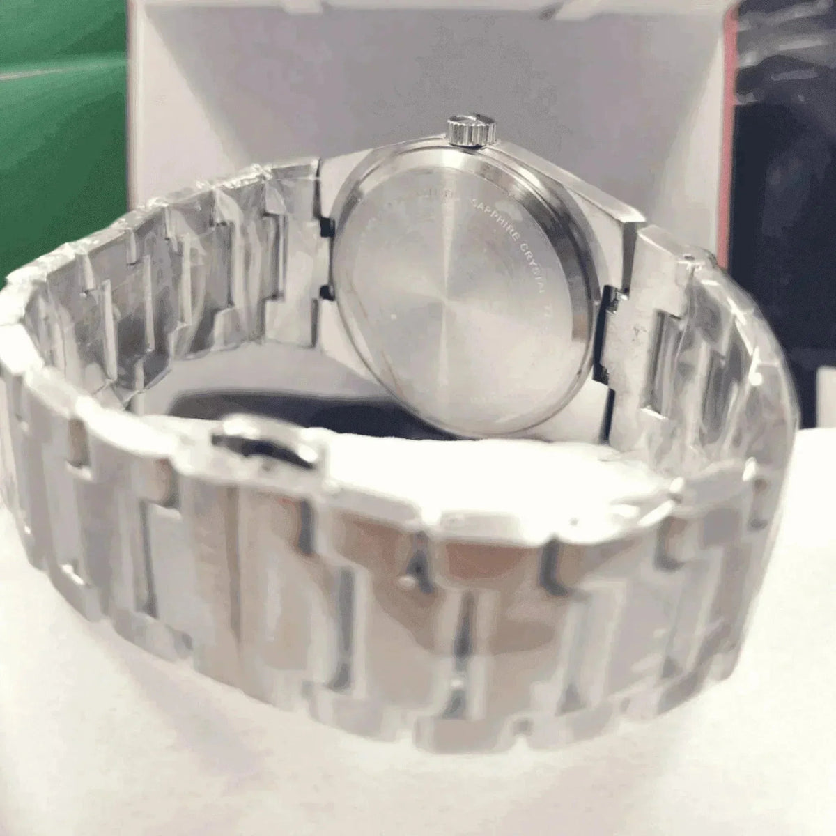 Stainless steel men's watch with metal bracelet and closed case back
